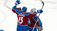Colorado Avalanche right wing Valeri Nichushkin (13) congratulates goaltender Scott Wedgewood (41) after the Avalanche defeated the Vegas Golden Knights 4-2 at T-Mobile Arena.