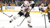 Chicago Blackhawks center Connor Bedard (98) makes a pass during a power play against the Vegas Golden Knights during the first period at T-Mobile Arena.