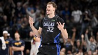 Dallas Mavericks forward Cooper Flagg (32) celebrates a three point basket during the second half against the Denver Nuggets at the American Airlines Center.