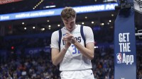 Dallas Mavericks forward Cooper Flagg (32) reacts after a play against the Oklahoma City Thunder during the second quarter at Paycom Center.