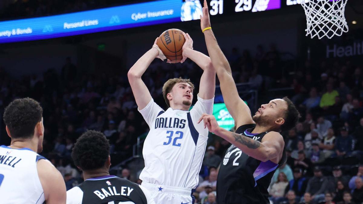 Dec 15, 2025; Salt Lake City, Utah, USA; Dallas Mavericks forward Cooper Flagg (32) goes to the basket as Utah Jazz forward Kyle Anderson (2) defends during the first quarter at Delta Center.