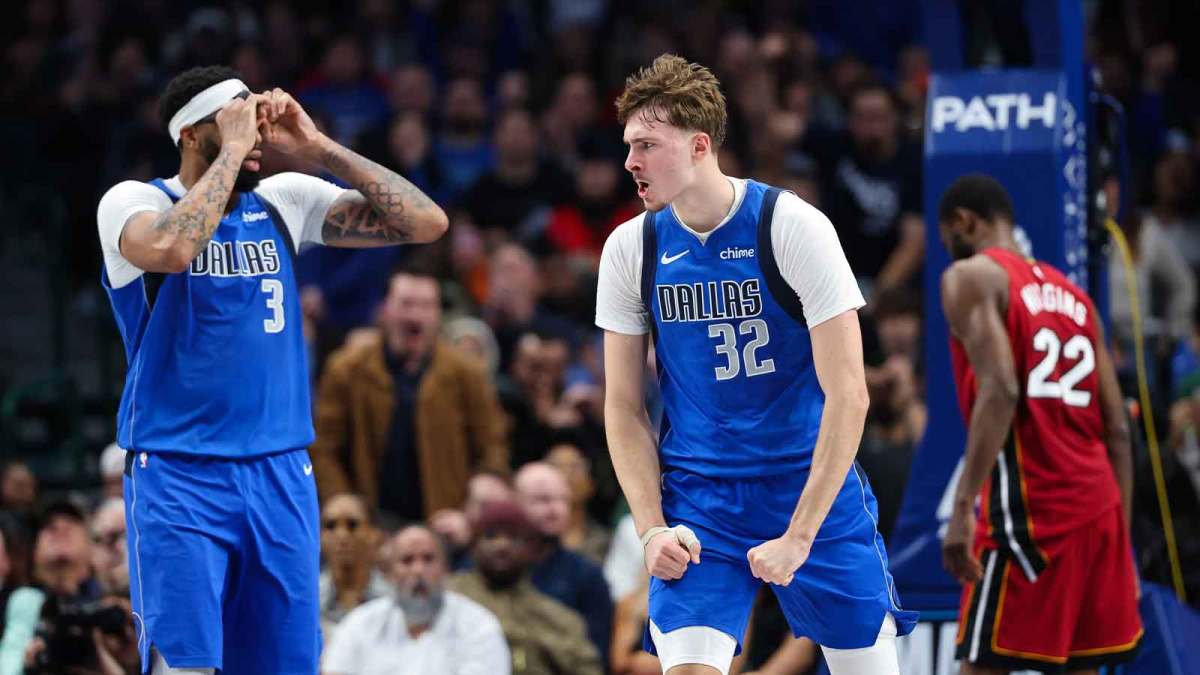 Dallas Mavericks forward Cooper Flagg (32) reacts after scoring during the fourth quarter against the Miami Heat at American Airlines Center.