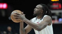 Portland Trail Blazers small forward Jerami Grant (9) warms up before the game against the Milwaukee Bucks at Moda Center.