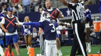 Dallas Cowboys wide receiver George Pickens (3) celebrates after catching a pass for a successful two-point conversion against the Kansas City Chiefs during the fourth quarter at AT&T Stadium.