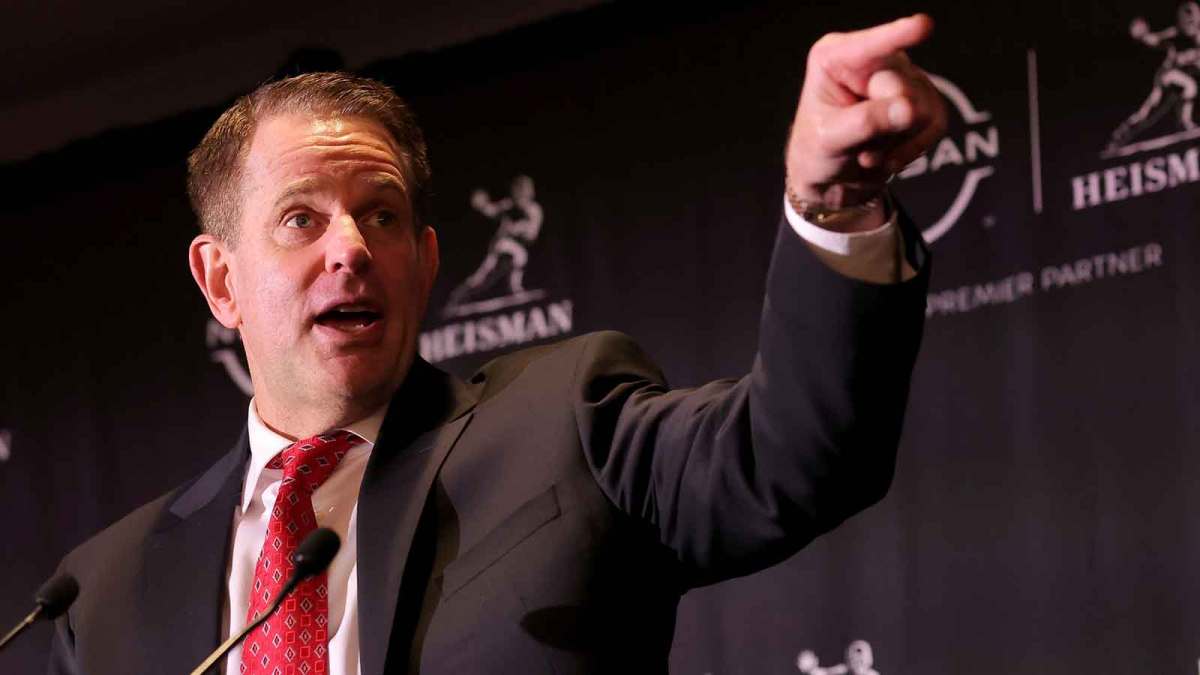 Indiana Hoosiers head coach Curt Cignetti speaks to players on his team in front of the media during a press conference at the New York Marriott Marquis after his quarterback Fernando Mendoza wins the Heisman trophy. Mandatory Credit: Brad Penner-Imagn Images