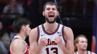 Dec 13, 2025; Champaign, Illinois, USA; Illinois Fighting Illini center Tomislav Ivisic (13) reacts after scoring during the second half against the Nebraska Cornhuskers at State Farm Center. Mandatory Credit: Ron Johnson-Imagn Images