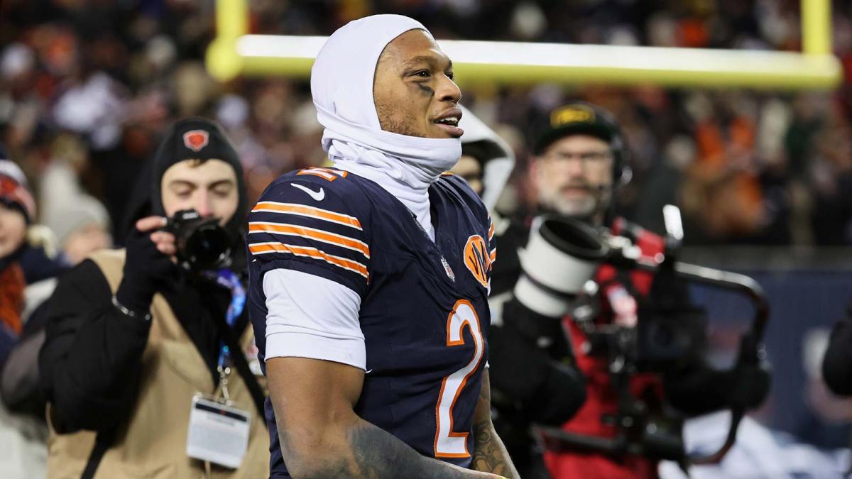 Chicago Bears wide receiver DJ Moore (2) reacts after catching the game-winning forty-six yard touchdown pass thrown by quarterback Caleb Williams (not pictured) in overtime against the Green Bay Packers at Soldier Field.