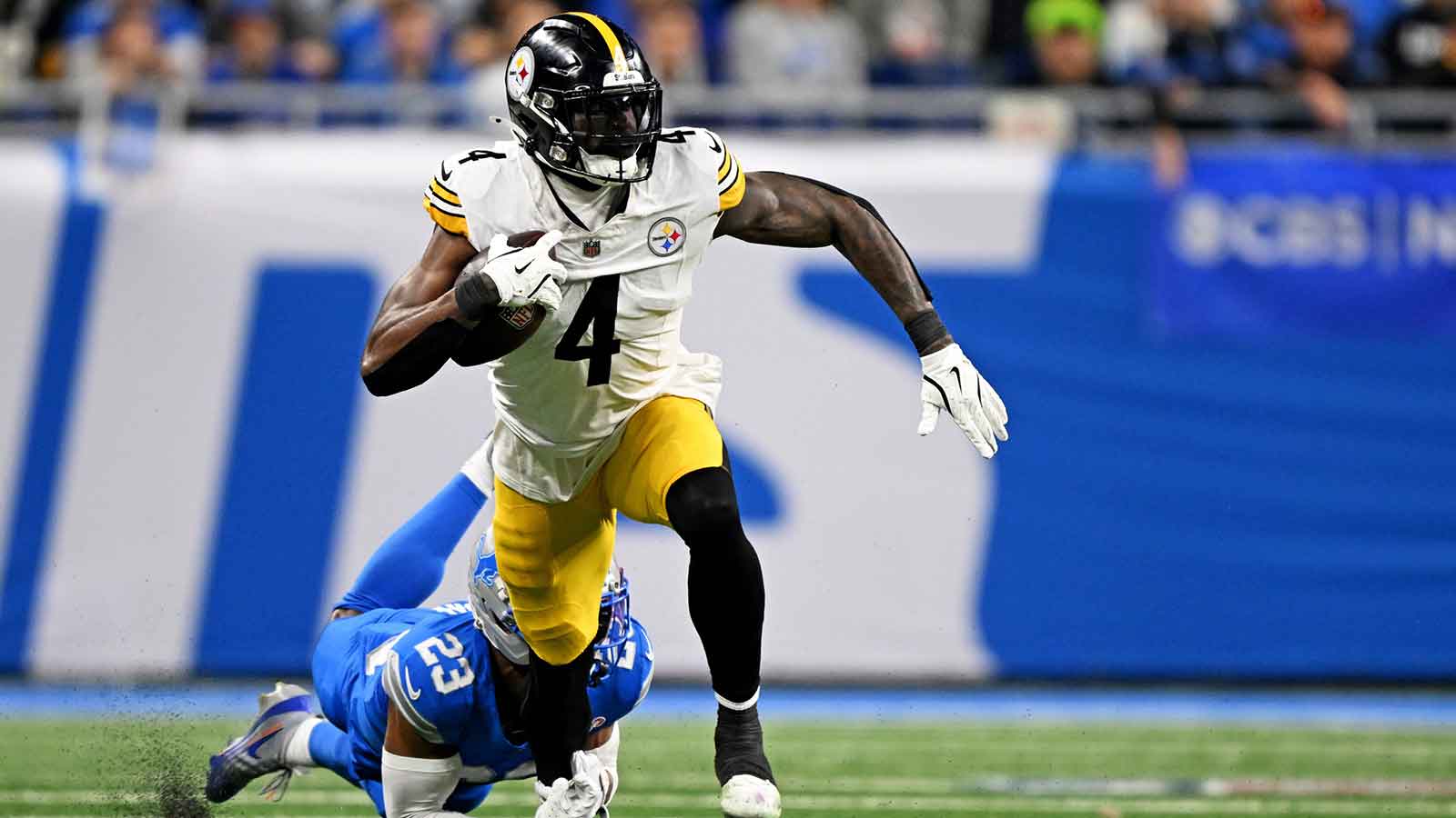 Detroit Lions cornerback Rock Ya-Sin (23) tackles Pittsburgh Steelers wide receiver DK Metcalf (4) during the fourth quarter at Ford Field.