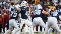 Dallas Cowboys quarterback Dak Prescott (4) passes the ball against the Washington Commanders in the fourth quarter at Northwest Stadium.