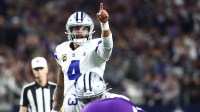 Dallas Cowboys quarterback Dak Prescott (4) calls signals during the second half against the Minnesota Vikings at AT&T Stadium.