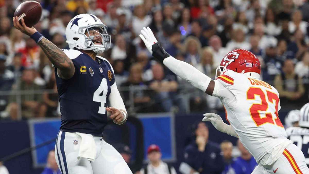 Dallas Cowboys quarterback Dak Prescott (4) throws a pass against Kansas City Chiefs safety Chamarri Conner (27) during the first quarter at AT&T Stadium.