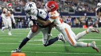 Kansas City Chiefs cornerback Trent McDuffie (22) forces a fumble from Dallas Cowboys wide receiver George Pickens (3) during the fourth quarter at AT&T Stadium.