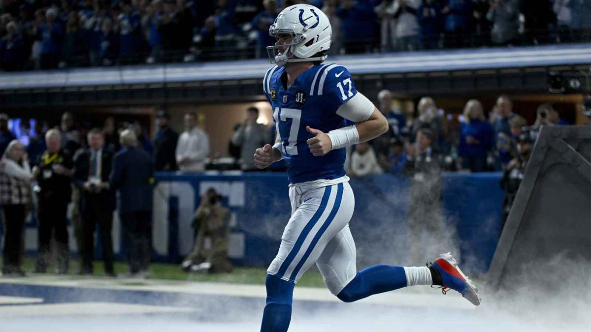 Indianapolis Colts quarterback Daniel Jones (17) is introduced before a game against the Houston Texans at Lucas Oil Stadium.