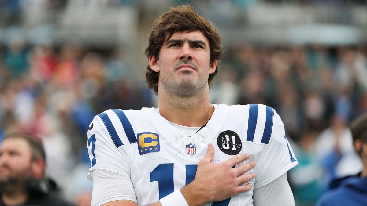 Indianapolis Colts quarterback Daniel Jones (17) stands on the field during the National Anthem before a game against the Jacksonville Jaguars at EverBank Stadium.