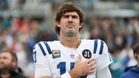 Indianapolis Colts quarterback Daniel Jones (17) stands on the field during the National Anthem before a game against the Jacksonville Jaguars at EverBank Stadium.