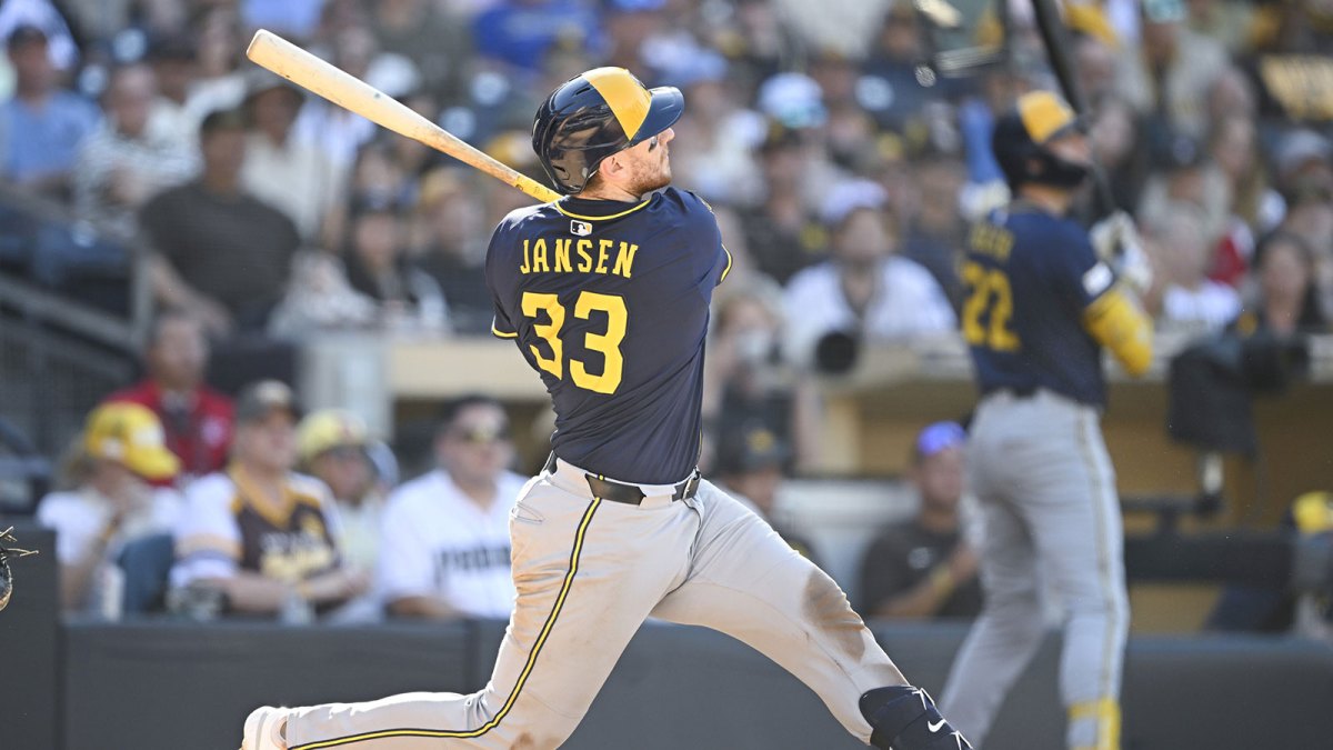 Milwaukee Brewers catcher Danny Jansen (33) hits a solo home run during the ninth inning against the San Diego Padres at Petco Park.