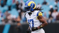 Los Angeles Rams wide receiver Davante Adams (17) warms up before the game against the Carolina Panthers at Bank of America Stadium.