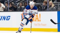 Edmonton Oilers forward David Tomasek (86) skates with the puck against the Seattle Kraken at Climate Pledge Arena.