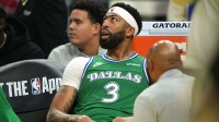 Dallas Mavericks forward Anthony Davis (3) sits on the bench after suffering an injury during the second quarter against the Golden State Warriors at Chase Center.