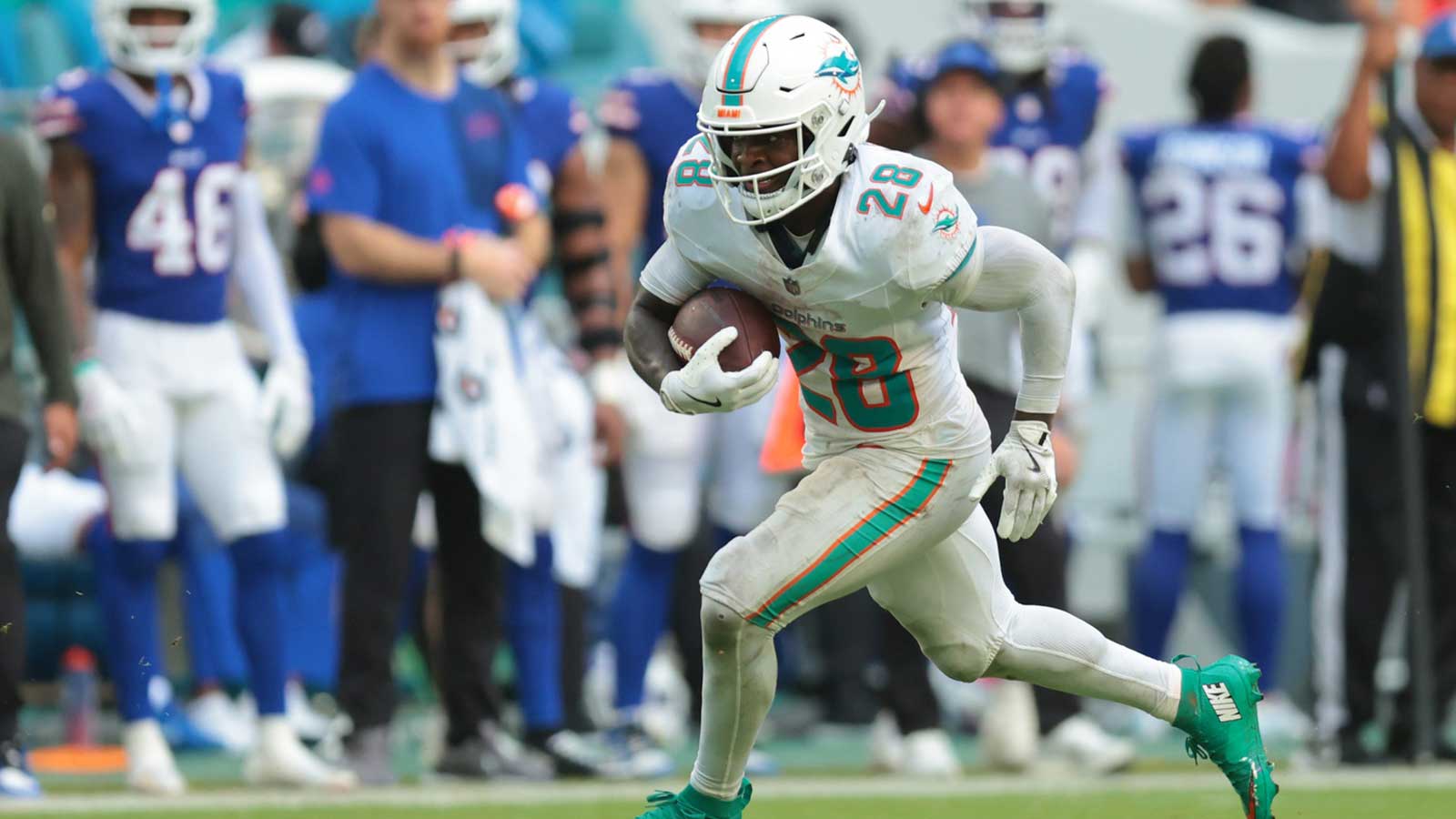 Miami Dolphins running back De'Von Achane (28) runs for a touchdown during the second half against the Buffalo Bills at Hard Rock Stadium.
