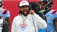 Delaware State head coach DeSean Jackson directs his team against South Carolina State at Alumni Stadium on Nov. 22, 2025.