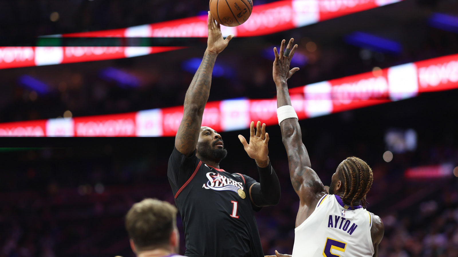 Philadelphia 76ers center Andre Drummond (1) shoots agains tLos Angeles Lakers center Deandre Ayton (5) during the third quarter at Xfinity Mobile Arena.