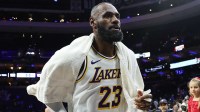 Los Angeles Lakers forward Lebron James (23) runs off the court after a victory against the Philadelphia 76ers at Xfinity Mobile Arena. Mandatory Credit: Bill Streicher-Imagn Images