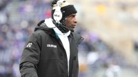 Colorado Buffaloes head coach Deion Sanders looks on during the second quarter against the Kansas State Wildcats at Bill Snyder Family Football Stadium.