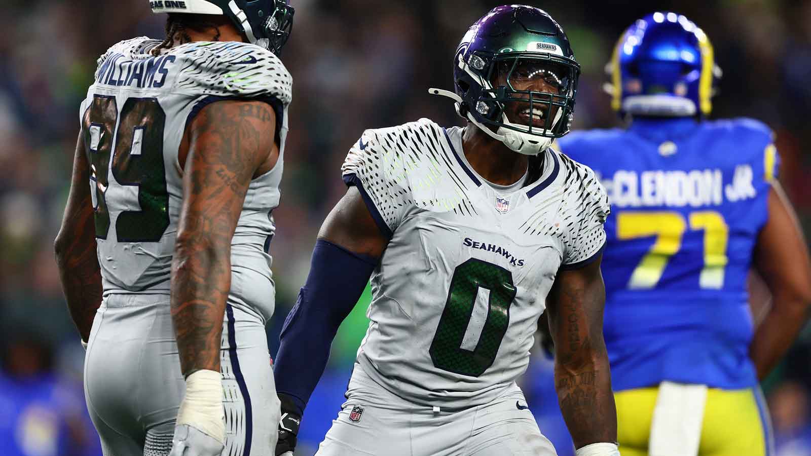 Seattle Seahawks defensive end Demarcus Lawrence (0) celebrates a sack against the Los Angeles Rams in the second half at Lumen Field. 