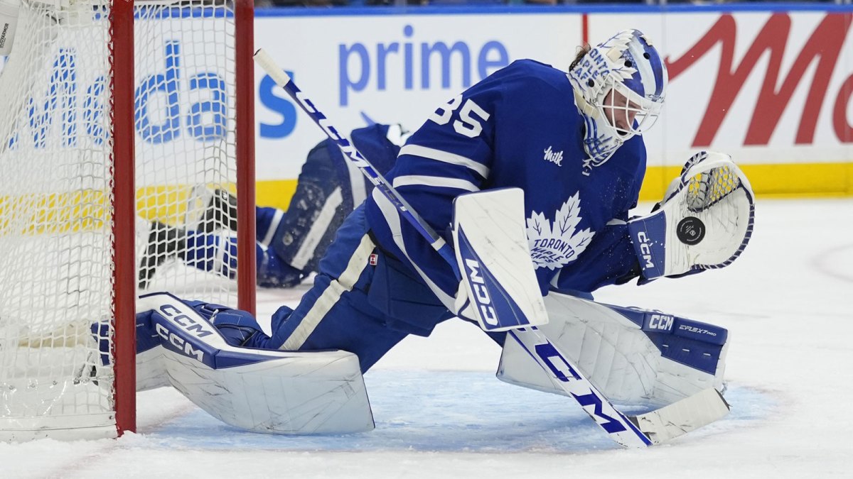 Toronto Maple Leafs goaltender Dennis Hildeby (35) makes a glove save against the Tampa Bay Lightning during the second period at Scotiabank Arena.
