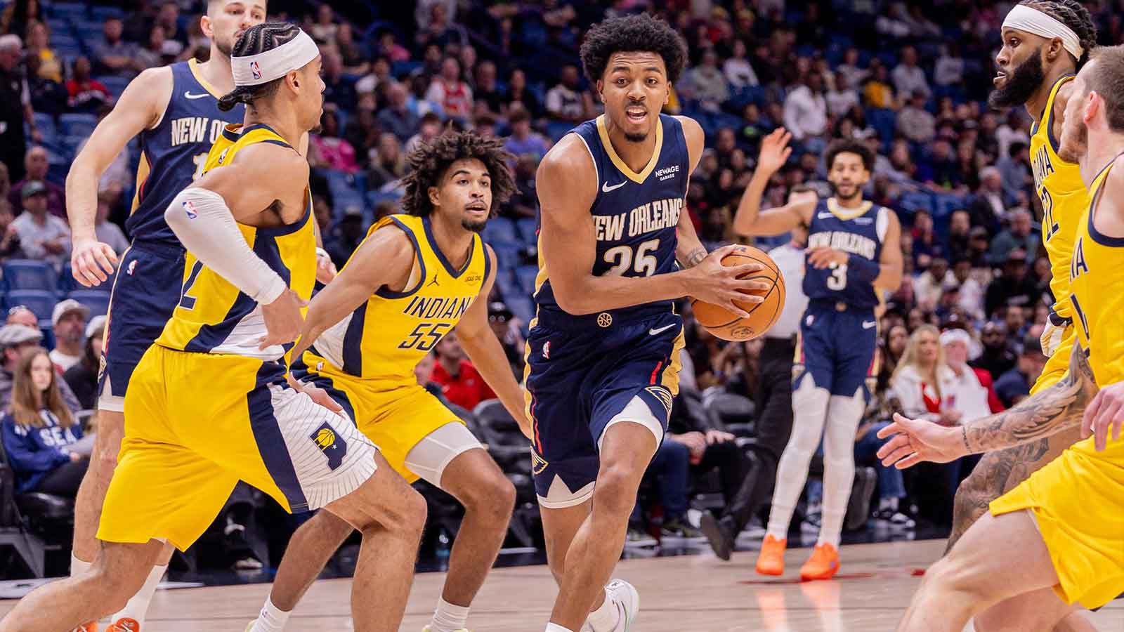 New Orleans Pelicans forward Trey Murphy III (25) dribbles against Indiana Pacers forward Isaiah Jackson (22) during the first half at Smoothie King Center.
