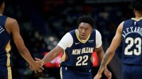 New Orleans Pelicans center Derik Queen (22) ceelbrates with forward Trey Murphy III (25) and guard Trey Alexander (23) during the first half against the Minnesota Timberwolves at Smoothie King Center.