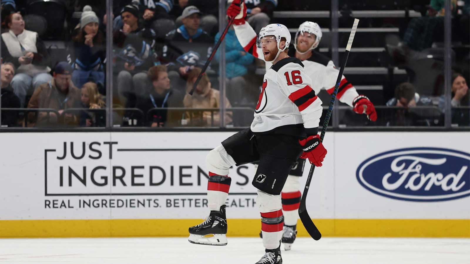 New Jersey Devils right wing Connor Brown (16) celebrates after scoring a goal against the Utah Mammoth during the second period at Delta Center.