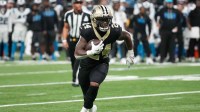 New Orleans Saints running back Devin Neal (24) runs the ball during the second quarter against the Carolina Panthers at Caesars Superdome.