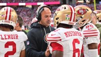 San Francisco 49ers defensive coordinator Robert Saleh speaks with 49ers safety Malik Mustapha (6) in the third quarter against the Arizona Cardinals at State Farm Stadium.