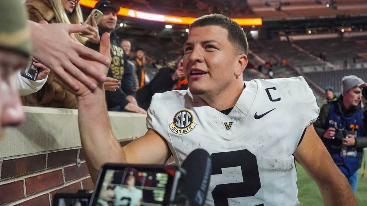 Vanderbilt quarterback Diego Pavia (2) celebrates with fans after winning a NCAA football game between Tennessee and Vanderbilt at Neyland Stadium in Knoxville, Tenn., on Nov. 29, 2025.