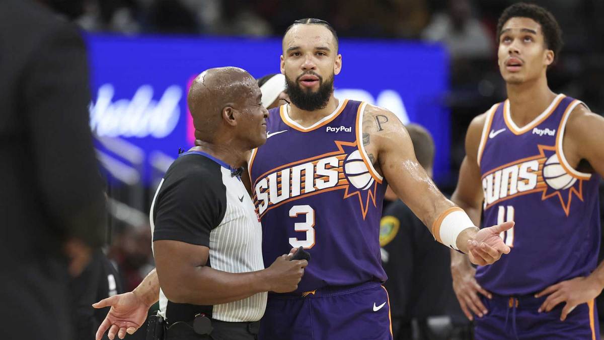 Phoenix Suns forward Dillon Brooks (3) reacts in front of a referee during the first quarter against the Houston Rockets at Toyota Center.