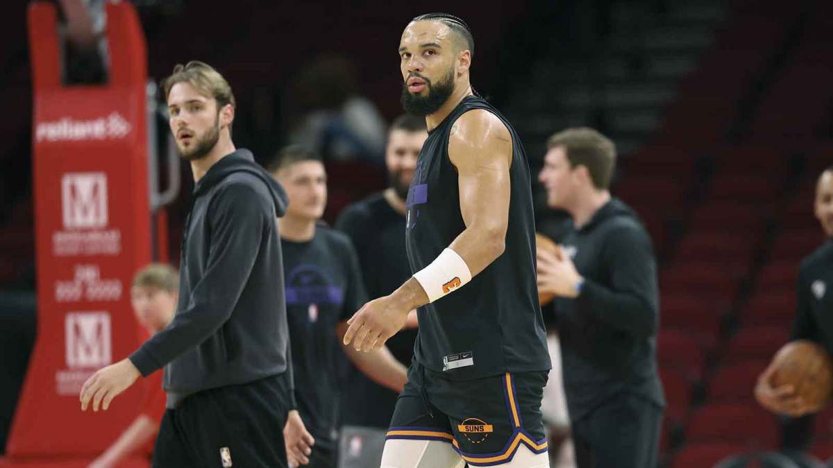Phoenix Suns forward Dillon Brooks (3) walks on the court before the game against the Houston Rockets at Toyota Center.
