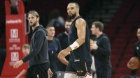 Phoenix Suns forward Dillon Brooks (3) walks on the court before the game against the Houston Rockets at Toyota Center.