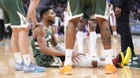 Milwaukee Bucks forward Giannis Antetokounmpo (34) goes down with an injury against the Detroit Pistons in the first half at Fiserv Forum. Mandatory Credit: Michael McLoone-Imagn Images