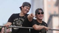 Los Angeles Dodgers two-way player Shohei Ohtani (17) and pitcher Yoshinobu Yamamoto (18) during the World Series championship parade and celebration.