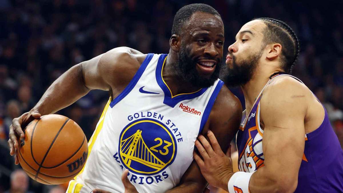 Dec 18, 2025; Phoenix, Arizona, USA; Golden State Warriors forward Draymond Green (23) against Phoenix Suns forward Dillon Brooks in the first half at Mortgage Matchup Center. Mandatory Credit: Mark J. Rebilas-Imagn Images