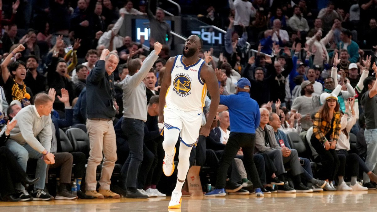 Golden State Warriors forward Draymond Green (23) reacts after making a three point basket against the Oklahoma City Thunder in the fourth quarter at the Chase Center.