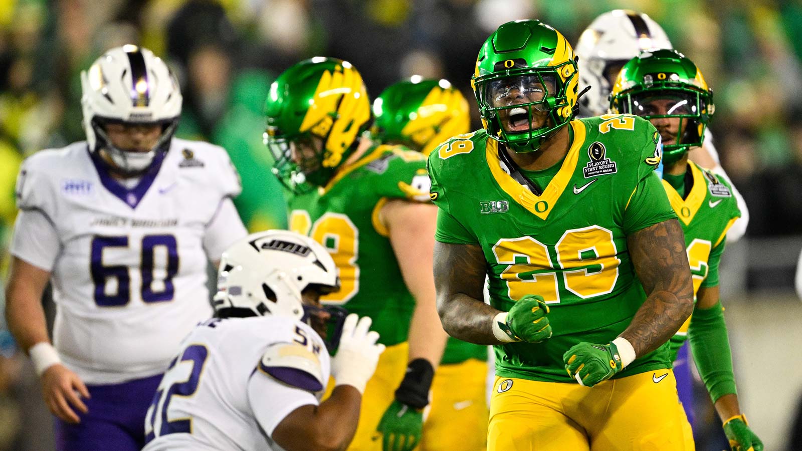 Oregon Ducks linebacker Ashton Porter (29) celebrates a tackle during the second quarter against the James Madison Dukes at Autzen Stadium.