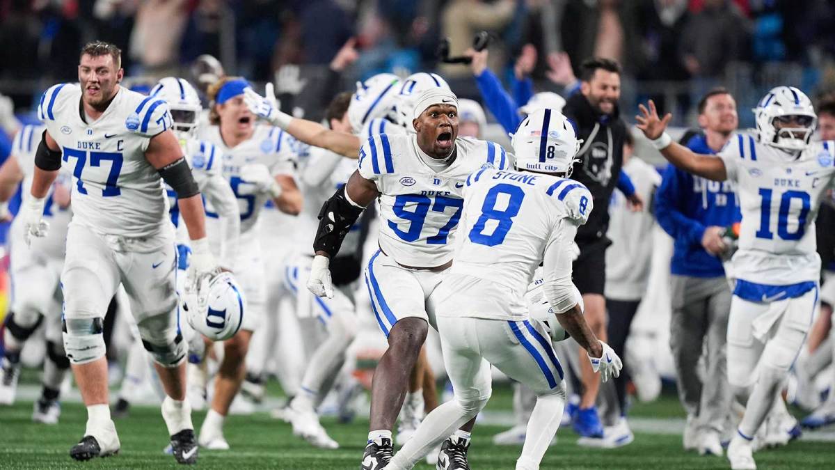 Duke Blue Devils defensive end Wesley Williams (97) celebrates defeating the Virginia Cavaliers during the 2025 ACC Championship game at Bank of America Stadium.