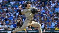 San Diego Padres starting pitcher Dylan Cease (84) delivers a pitch against the Chicago Cubs in the first inning during game two of the Wildcard round for the 2025 MLB playoffs at Wrigley Field.