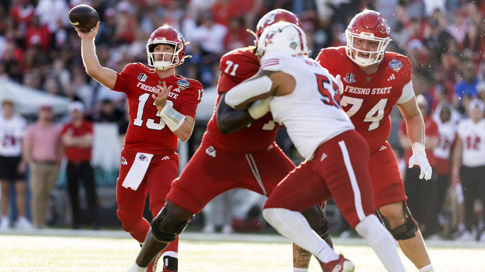 Fresno State Bulldogs quarterback E.J. Warner (13) against the Miami (OH) RedHawks during the Snoop Dogg Arizona Bowl at Casino Del Sol Stadium.