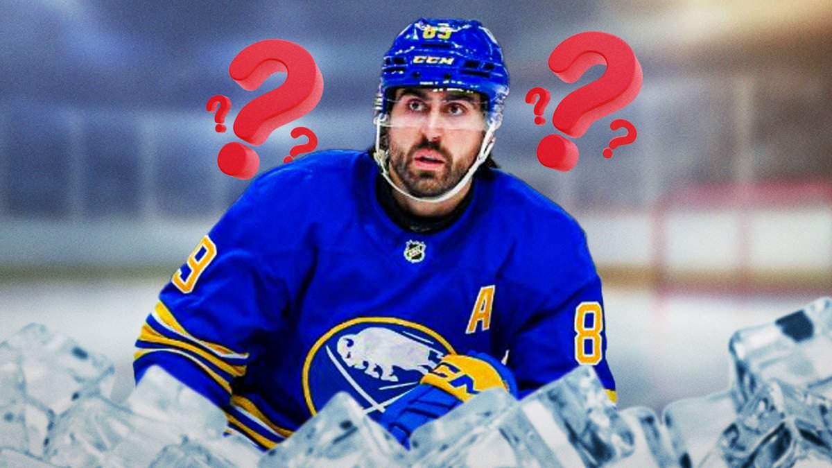 Alex tuch with question marks around him.