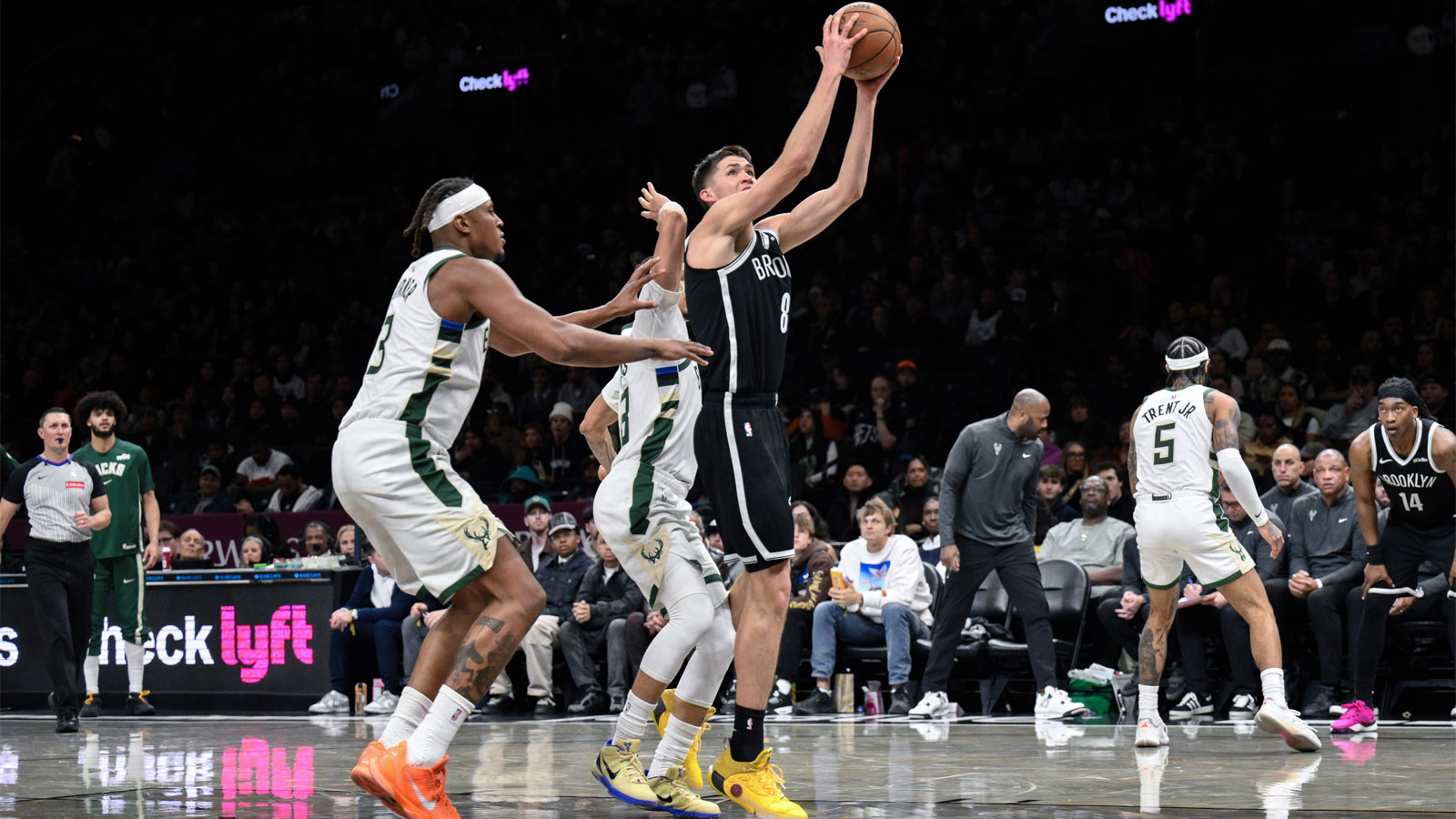 Brooklyn Nets guard Egor Demin (8) shoots the ball while defended by Milwaukee Bucks center Myles Turner (3) during the second half at Barclays Center.