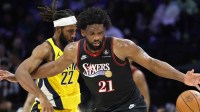 Philadelphia 76ers center Joel Embiid (21) looses control of the ball in front of Indiana Pacers forward Isaiah Jackson (22) during the third quarter at Xfinity Mobile Arena.